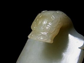 A White Jade Buckle of Qing Dynasty