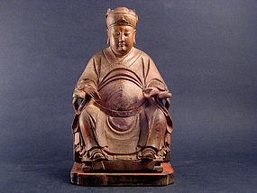 A Wood Seating Figure of a Scholar Official