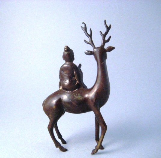 A Fine Bronze Piece of a Sage Riding on a Deer