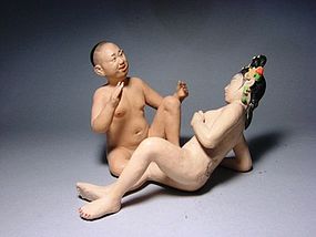A Pair of Mud Dolls in Amusing Erotic Scene