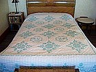 Hand-quilted, Embroidered Cross-Stitch Quilt