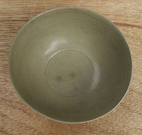 A Rare Five Dynasties Yue Mise Bowl with Bird Motive