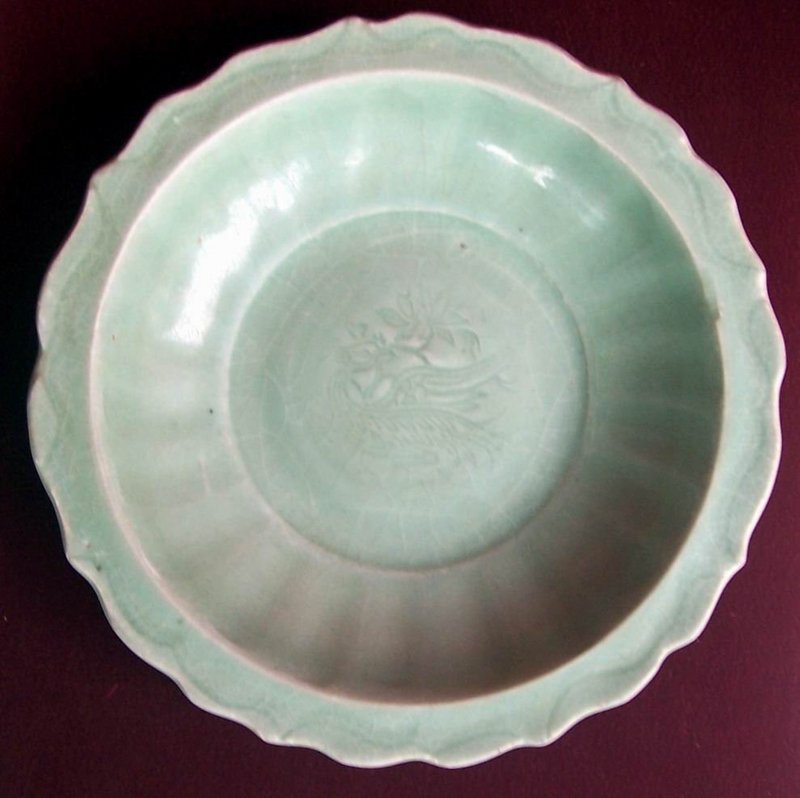 A Ming Celadon Dish with Bird motive