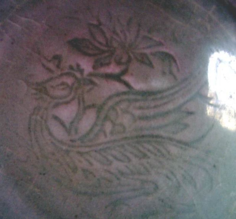 A Ming Celadon Dish with Bird motive
