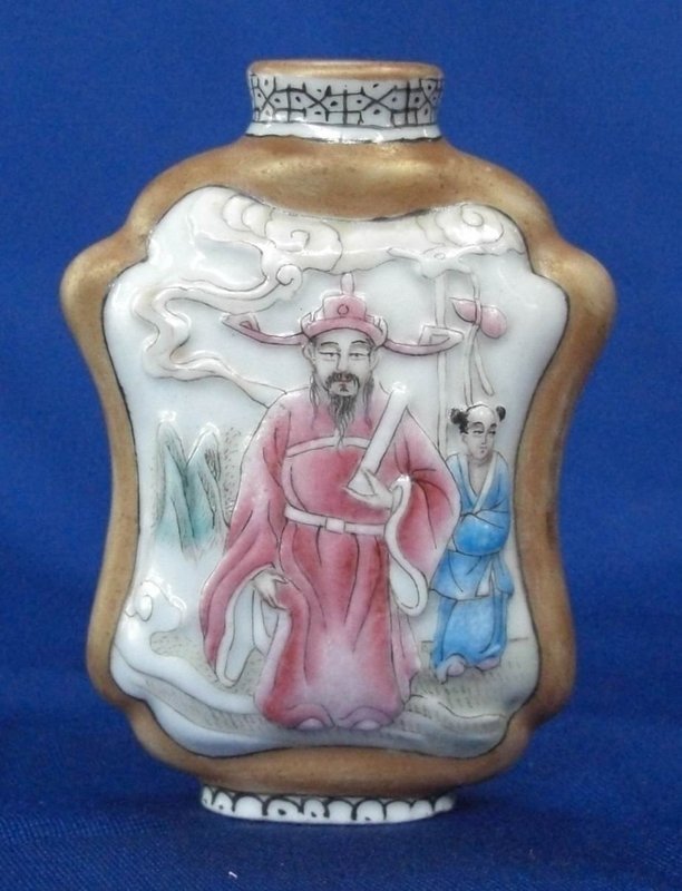 A Moulded Famille Rose Snuff Bottle