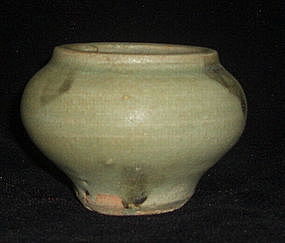 A Small Celadon Jar With Iron-Brown Spotted