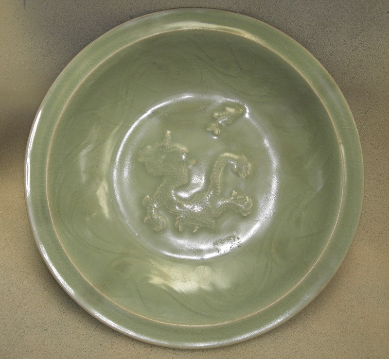 Rare Yuan dyn  celadon dish with dragon chasing fish