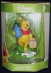 Disney Home Winnie the Pooh July figurine by Enesco