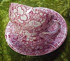 Old red chintz with peacock pattern lg cup & saucer