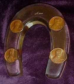 Lucite horseshoe paper weight from reno, lucky pennies