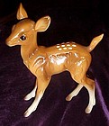 Delicate hand painted ceramic fawn figurine, deer