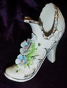 Vintage porcelain shoe with applied  flowers