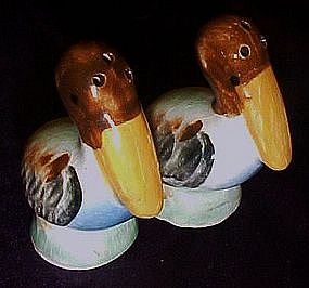 Vintage hand painted pelican salt and pepper shakers