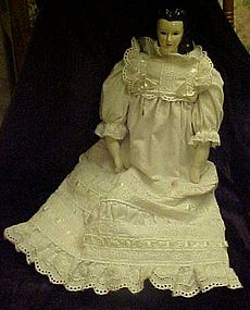 Pretty hand made china doll with petticoat and dress