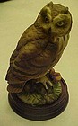 Nice porcelain owl figurine on wood base.