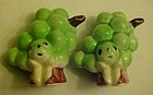 Vintage anthropomorphic faces  green grape shakers