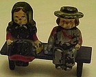 Old Dalecraft metal Amish couple on bench s&p shakers