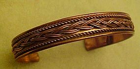 Copper cuff bracelet with rope and braid