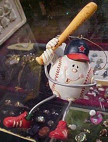 Anthropomorphic future slugger baseball ornament.