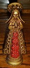 Vintage Virgin Mary plastic statue gold and red