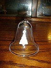 Glass bell ornament with Christmas tree clapper