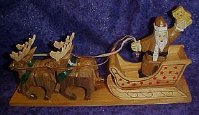 Carved wood Santa sleigh and reindeer decoration