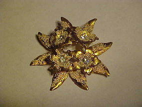 Goldtone flower pin with rhinestones AUSTRIA