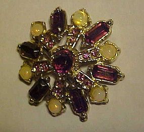 Vintage snowflake pin with amethyst rhinestones