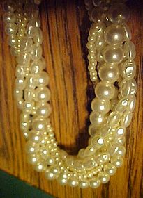 Six strand faux pearl necklace
