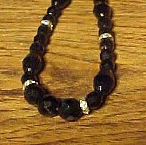 Vintage black glass faceted bead necklace with rondells