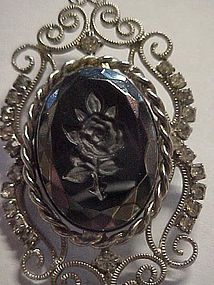 Rhinestine pin with black carved rose center
