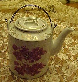 Vintage Asian style porcelain teapot with red florals