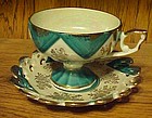 Fancy vintage cup and saucer articulated with lustre