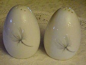Vintage egg shape porcelain shakers with pine branch
