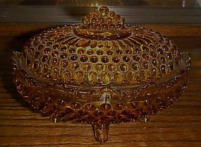 Fenton amber hobnail oval covered candy dish