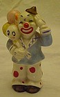 Vintage clown figurine with anthropomorphic balloons