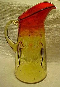 Vintage mold blown  Amberina pitcher with eagle