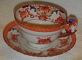 Antique Japanese tea cup and saucer with bird handle