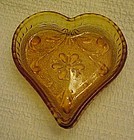 Tiara sandwich amber  glass heart nut dish  by Indiana