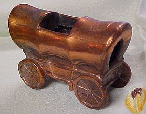 Old cast metal covered wagon ashtray toothpick?