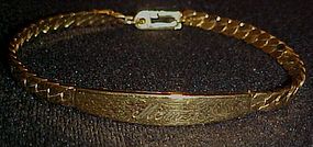 Pretty  gold tone Id bracelet  by Spiedel engraved MOM