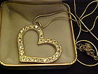 Large rhinestone heart necklace on chain