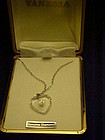 Vanessa Crystal heart Necklace with tiny diamond center