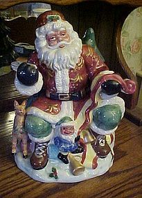 Santa checking his list ceramic cookie jar