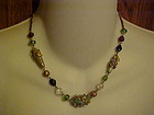 Cookie Lee glass beaded necklace with metal vine wrap