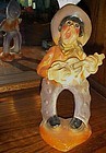 Vintage chalk carnival bow legged cowboy figurine
