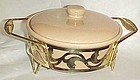 Vintage Bauer tan fleck casserole and metal stand