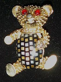 Vintage teddy bear pin with celluloid plaid belly