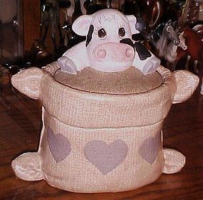 Cow in a feed sack  ceramic cookie jar