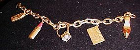 Vintage Avon charm bracelet, ring credit card lipstick